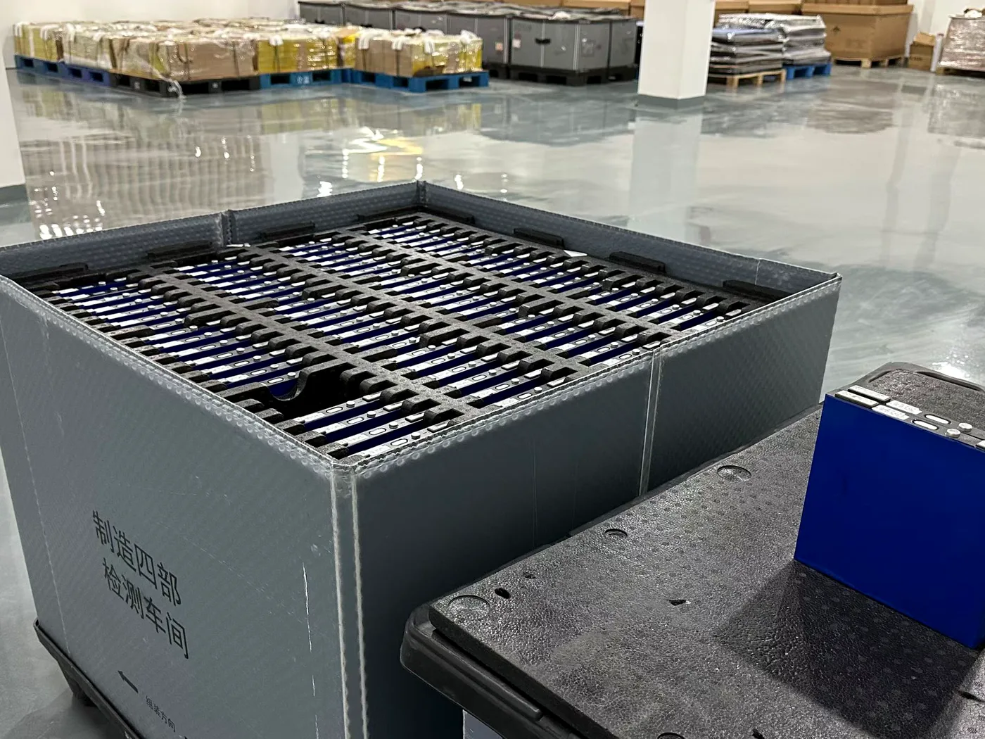 Battery cells arranged for inspection and sorting in a clean workshop