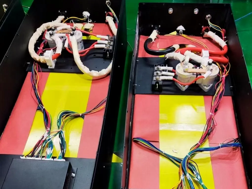 Open lithium battery pack with internal wiring, BMS, and cable routing